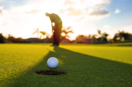 Man playing golf on the golfing range